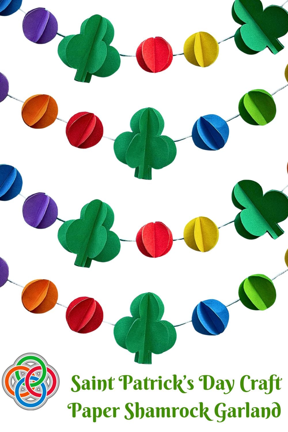 Saint Patrick's Day paper garland with 3D green shamrocks and colorful rainbow paper balls hanging on string, with Irish American Mom logo and text reading 