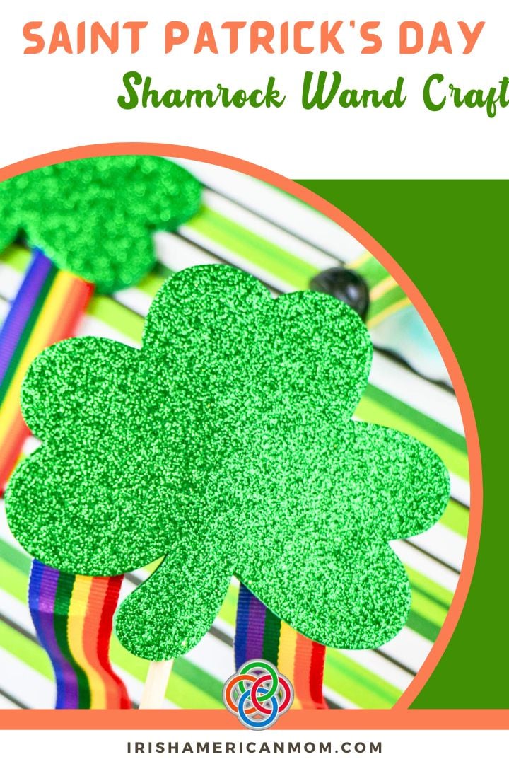 Saint Patricks Day Shamrock Wand Craft | Irish American Mom Pinterest graphic reading “Saint Patrick’s Day Shamrock Wand Craft” featuring a glittery green shamrock wand with rainbow ribbon streamers and Irish American Mom branding.
