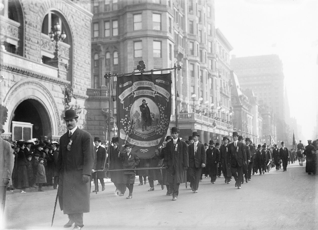 Black and white vintage photo of a Saint Patrick's Day parade in New York City.