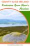 View of Queen Maeve’s Cairn on the summit of Knocknarea Mountain in County Sligo, Ireland, overlooking Sligo Bay and the surrounding countryside.