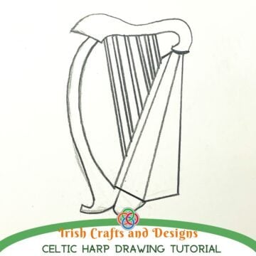 Pencil sketch of a traditional Celtic harp with curved frame and vertical strings on white paper, with text reading “Irish Crafts and Designs Celtic Harp Drawing Tutorial” and a Celtic knot logo.