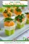 Pinterest graphic featuring Irish flag appetizer stacks made with honeydew, feta, and cantaloupe topped with mint and cocktail picks, with text reading “Irish Cuisine Irish Flag Appetizer Stacks” and IrishAmericanMom.com at the bottom.