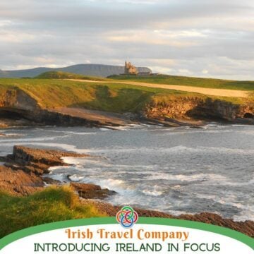 Rocky coastline at Mullaghmore in County Sligo, Ireland, with Classiebawn Castle on a grassy headland and Benbulben mountain in the distance along the Wild Atlantic Way.
