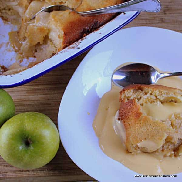 Eve’s pudding with stewed apples and golden sponge topping served with custard.