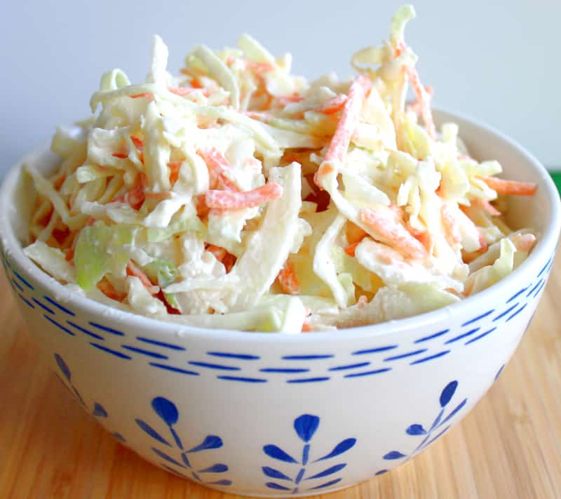 Bowl of creamy Irish coleslaw with shredded cabbage and carrots