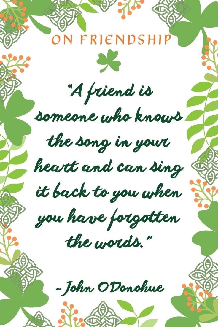 Decorative Irish-themed quote graphic with green leaves, Celtic knot patterns, and shamrocks featuring a John O’Donoghue quote: “A friend is someone who knows the song in your heart and can sing it back to you when you have forgotten the words.”