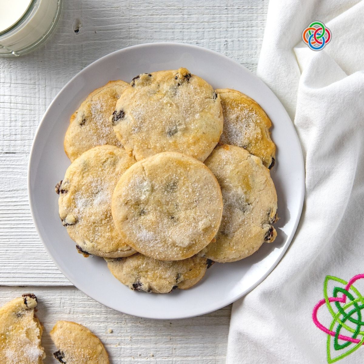 Plate of traditional Irish Easter biscuits with currants and golden edges