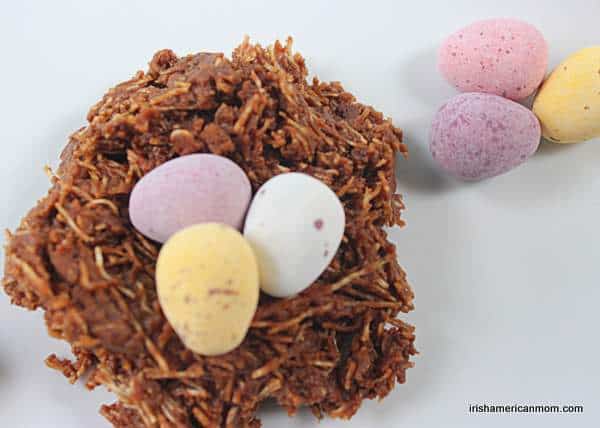 Chocolate Easter nests made with shredded wheat and topped with mini eggs