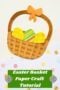 Finished paper Easter basket craft with woven brown base, handle with bow, and colorful decorated eggs, with text reading Easter Basket Paper Craft Tutorial.
