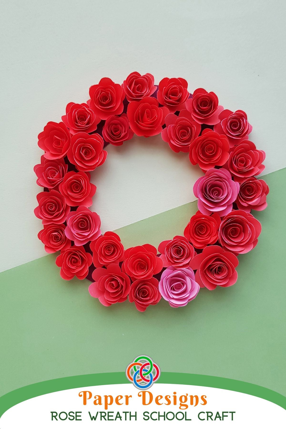 Red paper rose wreath laid on a pale background, used as a decorative craft project image with text banner.