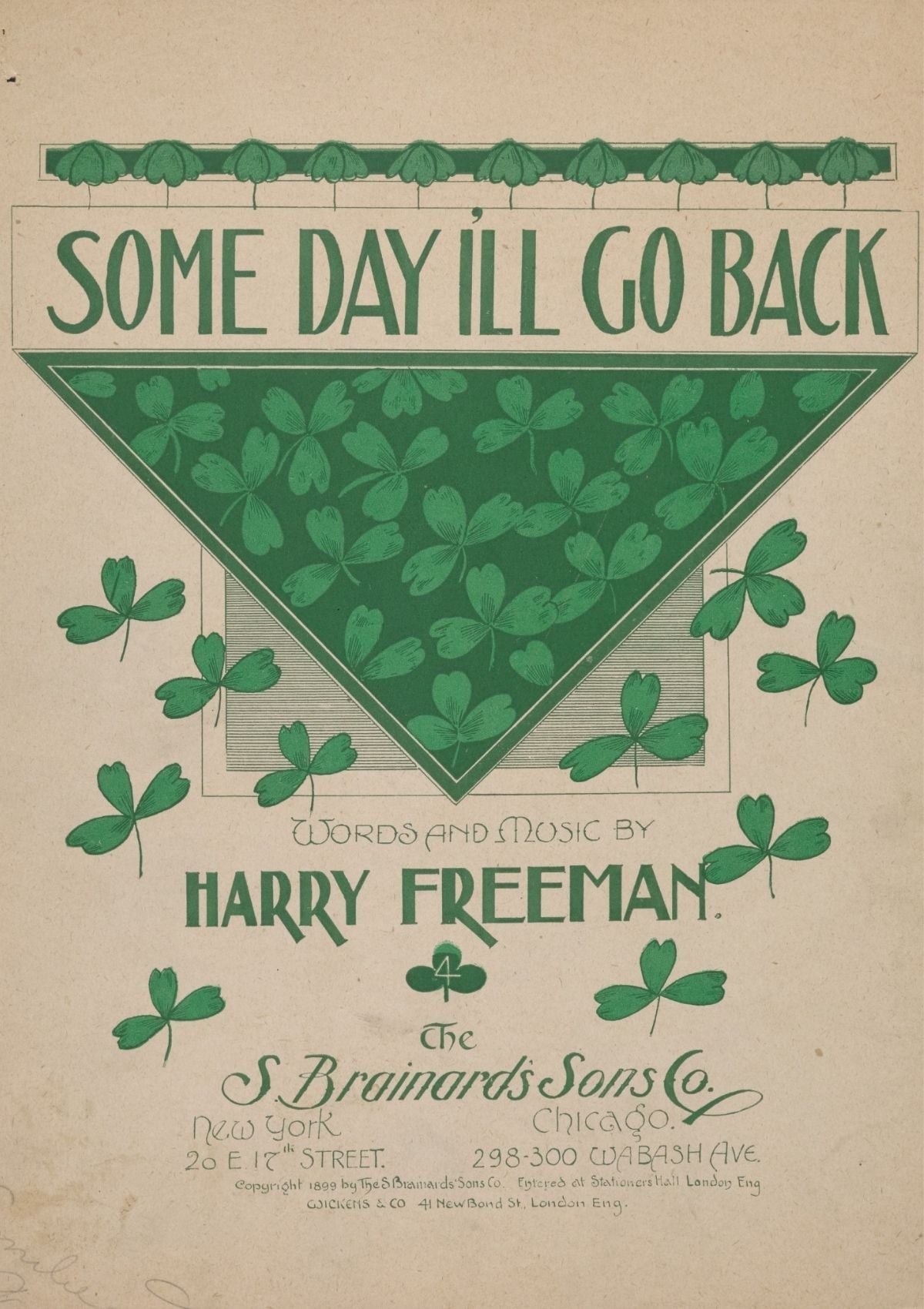 Sheet music cover for Some Day Ill Go Back by Harry Freeman | Irish American Mom Vintage sheet music cover with green shamrocks and the title Some Day I'll Go Back by Harry Freeman.