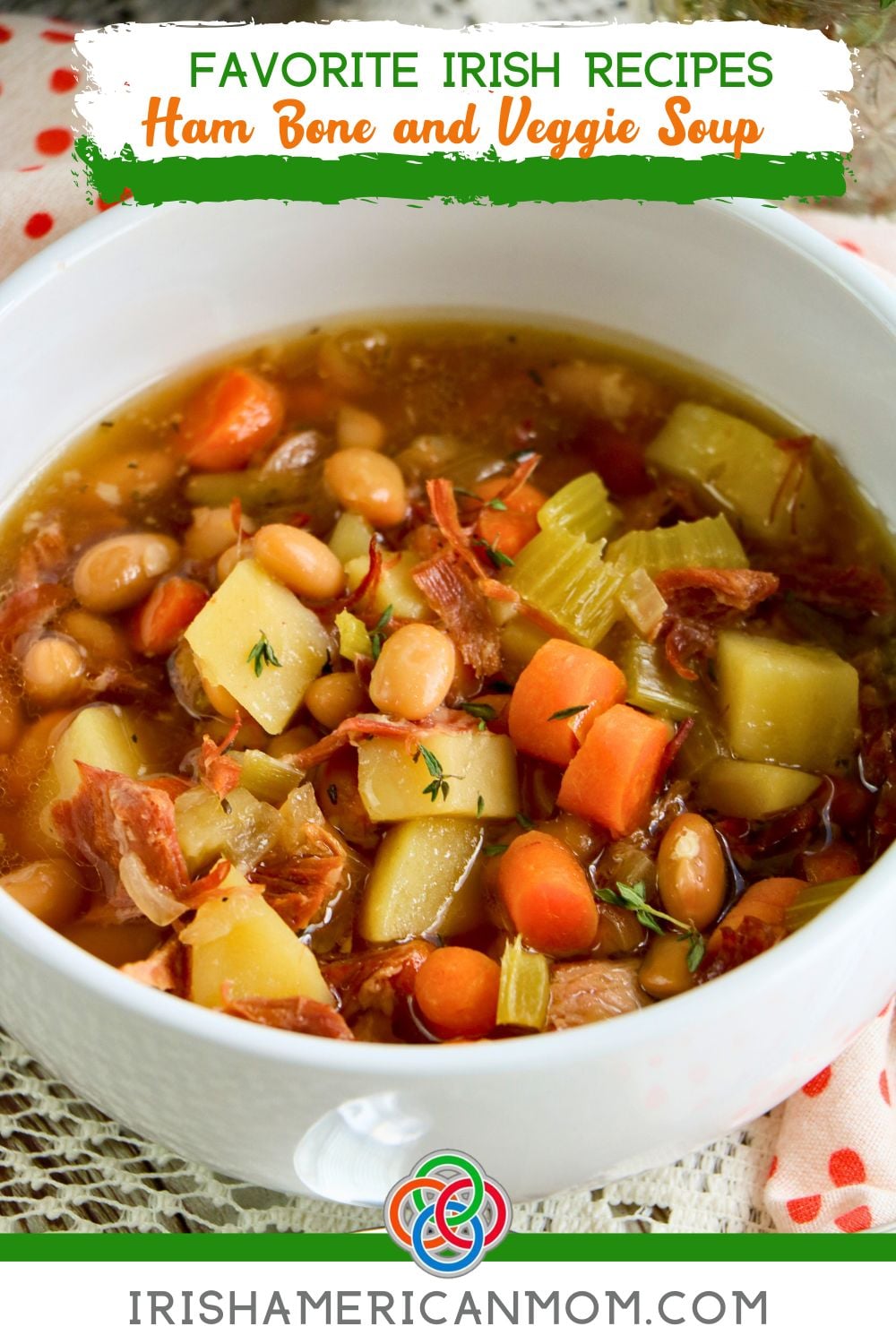 Favorite Irish Recipe Ham Bone and Veggie Soup | Irish American Mom Pinterest image for Irish ham bone and vegetable soup featuring a hearty bowl of soup with shredded ham, potatoes, carrots, celery and white beans.