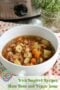 Bowl of homemade slow cooker ham bone soup with shredded ham, potatoes, carrots, celery and white beans, pictured beside a Crock-Pot and fresh thyme.