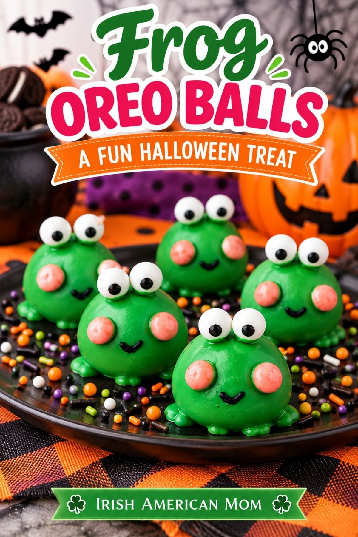 Frog Oreo Balls A Fun Halloween Treat | Irish American Mom Five bright green Frog Oreo Balls decorated with candy eyes, pink cheeks, and black icing smiles on a black platter scattered with colorful Halloween sprinkles. A jack-o'-lantern, bats, and spider decorate the background, with text reading "Frog Oreo Balls โ A Fun Halloween Treat" and Irish American Mom branding.